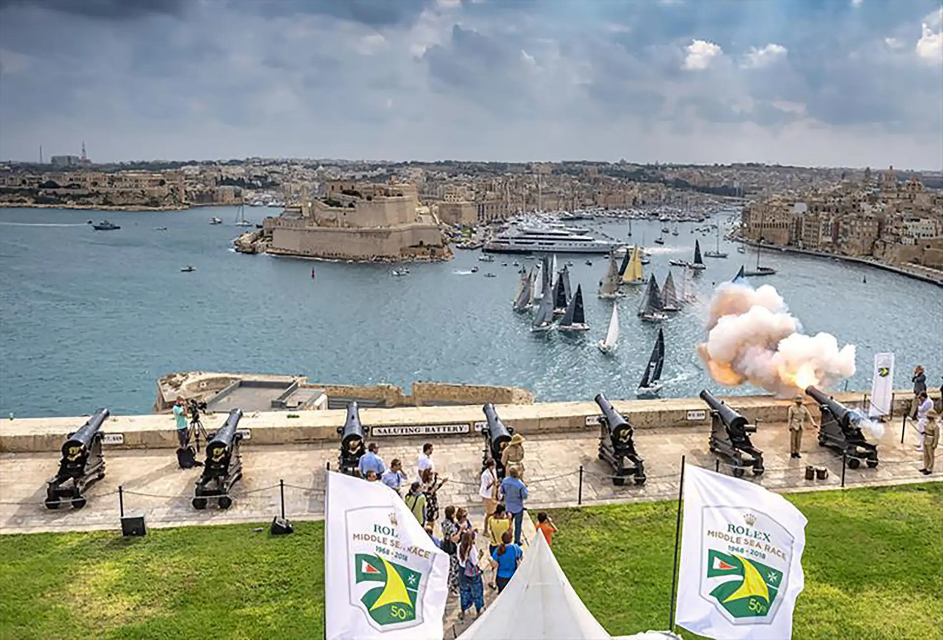 A thunderous crash of cannons from the Saluting Battery as sailboats set off from Malta's historic Grand Harbour.